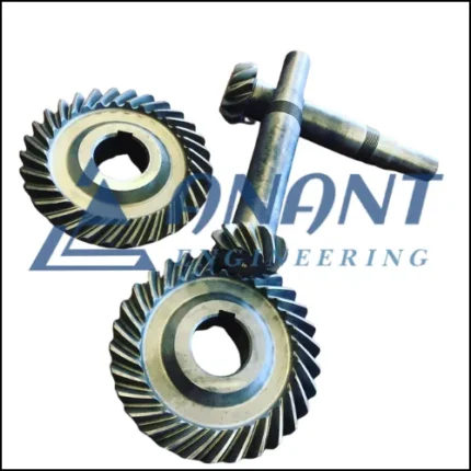 A close-up image of Anant Engineering's straight and spiral bevel gears used in mechanical systems.